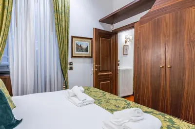a bathroom with a toilet and a sink and a shower at Pantheon Antique Suite in Rome