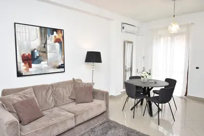 a living room with a couch and a table at Diasof Apartments in Rome