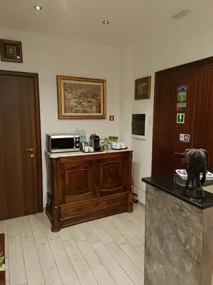 a kitchen with a counter with a microwave on it at Vatican Break Home in Rome
