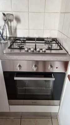 a stove top oven sitting in a kitchen at Studio della Pace, Classy & Charming - RENOVATED in Rome