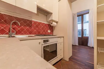 a kitchen with a sink and a stove top oven at Unique opportunity to live in a Renaissance palace - AC/WI-FI in Rome