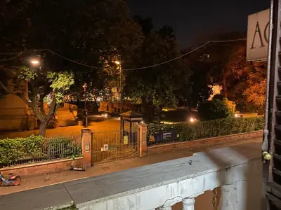 a view of a street at night with lights at Aquarium Termini in Rome