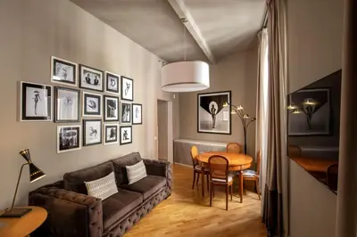 a living room with a couch and a table at Piazza di Spagna Moda Luxury Apartment in Rome