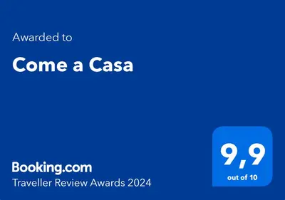 a blue sign with the text wanted to come a casa at Come a Casa in Rome