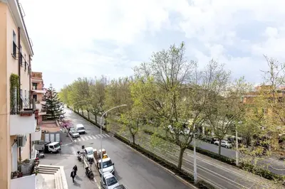 a street with cars parked on the side of the road at LIVING ROME Int 2 in Rome