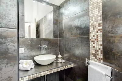 a bathroom with two toilets and a sink at B&B Colosseo Panoramic Rooms in Rome