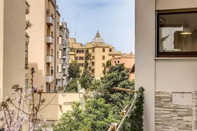 a view of a city from a window at GuestHouse near St.Peter in Rome