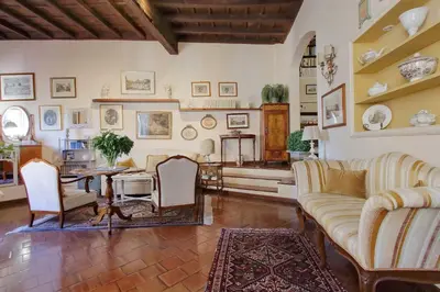 a living room with couches and a table at Casa dell'Angelo in Rome
