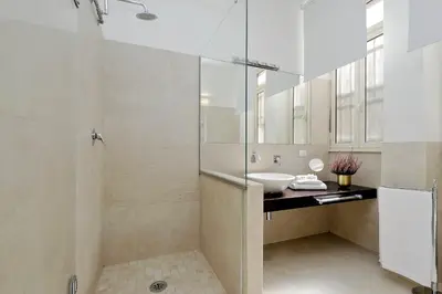 a bathroom with a sink and a shower at Restart Accommodations Celimontana in Rome