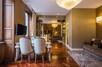 a bathroom with three sinks and a large mirror at The Inn at the Spanish Steps Luxury Collection - The Club Condotti 91 in Rome