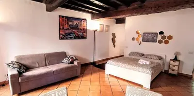 a living room with two couches and a couch at Sweet Home Panisperna in Rome