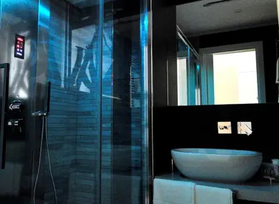 a bathroom with a sink and a glass shower at Jazz Style in Rome
