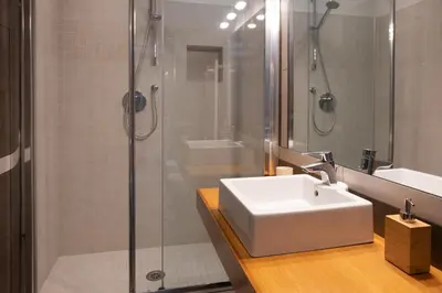a bathroom with a sink and a shower at Appartamento Margherita 2 in Rome