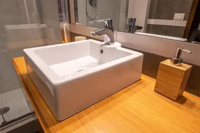 a bathroom with a white sink and a mirror at Appartamento Margherita 2 in Rome