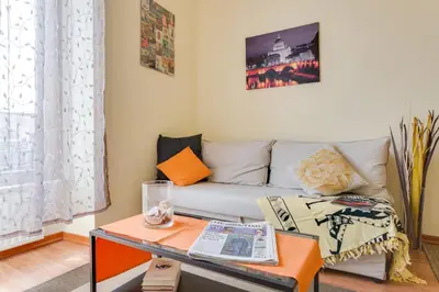 a living room with a couch and a table at St. Joseph Apartment 47 in Rome