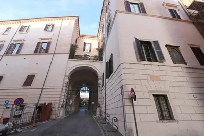 an entrance to a building with an archway at Lovely Navona Apartment in Rome