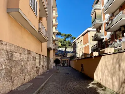 an alley between two buildings in a city at Casa Alberto in Rome