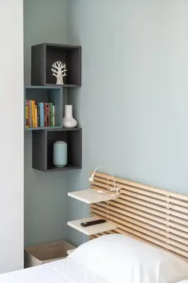 a bedroom with a bed and a book shelf at Penthouse with Panoramic Terrace -3 Min to Metro A in Rome