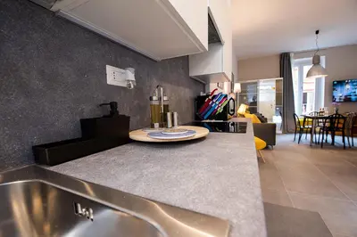 a kitchen with a sink and a counter top at Cosy studio in the greenest corner of Trastevere in Rome