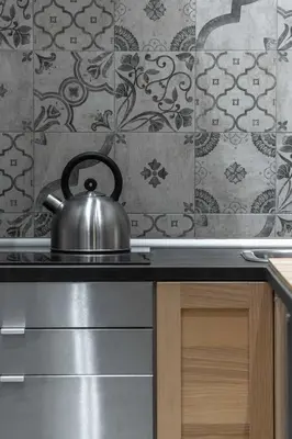 a tea kettle sitting on top of a stove at Corso 101 in Rome