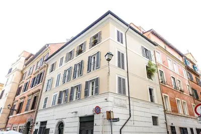 a large white building on the side of a street at Boutique Apartment Pantheon in Rome