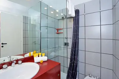 a bathroom with a sink and a shower at Welcome to Trastevere in Rome