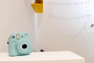 a blue camera sitting on top of a table at Relais Mantellini in Rome