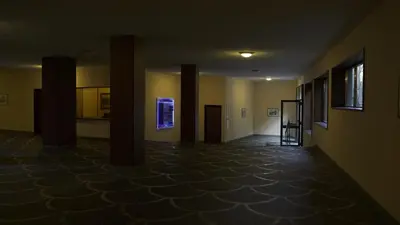 an empty hallway with columns in a building at A un passo dal centro in Rome