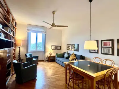 a living room with a couch and a table at Casa Pinturicchio in Rome