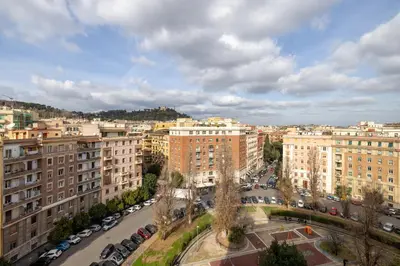 an aerial view of a city with buildings at Top Floor Apt with Rooftop Terrace near St. Peter in Rome