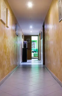 an empty hallway with a television in a building at On The Rainbow B&B in Rome
