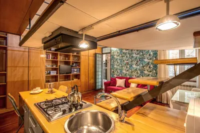 a kitchen with a sink and a stove at San Calisto Suite in Rome