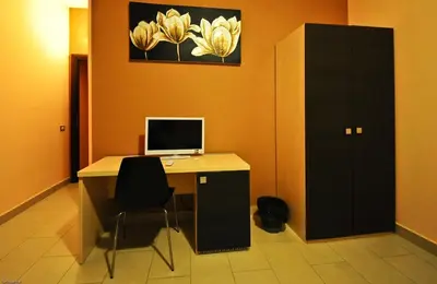 a room with a desk with a computer on it at Hotel Mosaic Central Rome in Rome