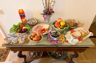 a table topped with lots of different types of food at B&B La Scalinatella in Rome