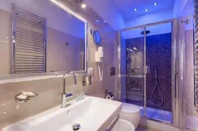 a bathroom with a sink and a toilet and a shower at Quality in Rome in Rome