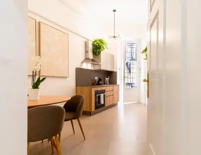 a bathroom with a white sink and a mirror at Ciao Bella Apartment in Rome