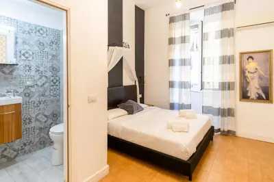 a small kitchen with a sink and a stove at Ciao Bella Apartment in Rome