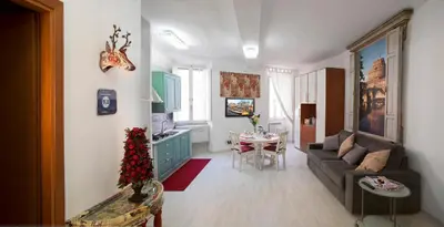 a living room with a couch and a table at Navona Open Space Apartments in Rome