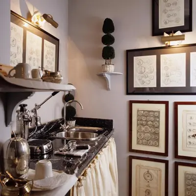 a kitchen with a sink and a counter top at Residenza Napoleone III in Rome