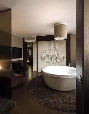 a bathroom with a large tub in a room at Rome Life Hotel in Rome