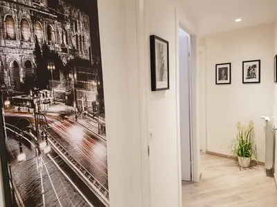 a hallway with a wall mural of a city at Domus Barberini in Rome