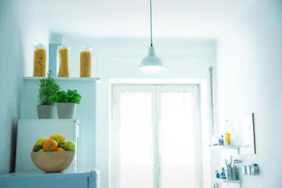 a room with a bowl of fruit on a shelf at Casa Alberone in Rome