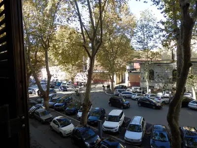 a view of a parking lot with cars parked at At Rome St. Peter's in Rome
