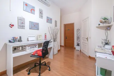 a home office with a desk and a chair at BB Danilo in Rome