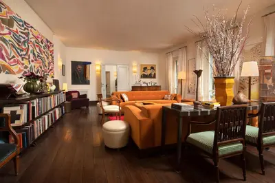 a living room with a couch and a table at Buonanotte Garibaldi in Rome