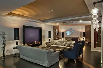 a living room with a couch and a table at Hotel Caravel in Rome