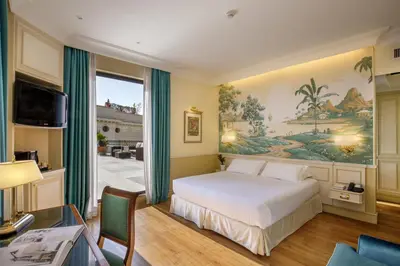 a bedroom with a bed and a large window at Donna Laura Palace by OMNIA hotels in Rome