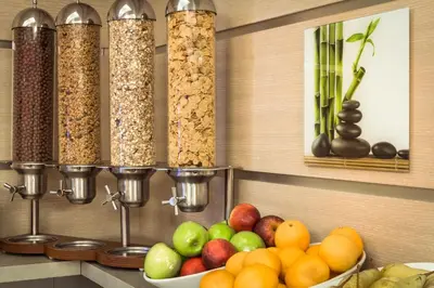 a kitchen counter with a bowl of fruits and nuts at Hotel Raganelli in Rome