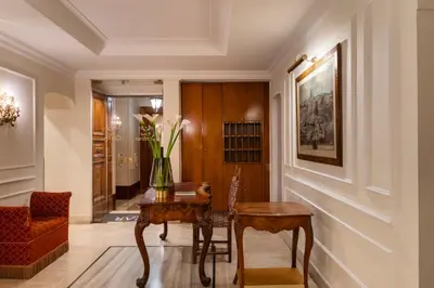 a home office with a desk and a chair at Hotel Cortina in Rome