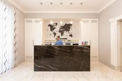 a kitchen with a black marble counter top at Hotel Virgilio in Rome